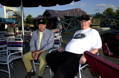 Director Bill Chvala and Writer/Producer Dennis Mailliard wait for the sun to set for the Fun Plex night dance and swim scenes. 