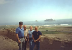Crew overlooking the coast. L-R: Terry Field, Father Charles Coulter, Ron Chvala and Bill Chvala. 